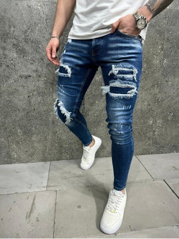 Blue skinny distressed jeans