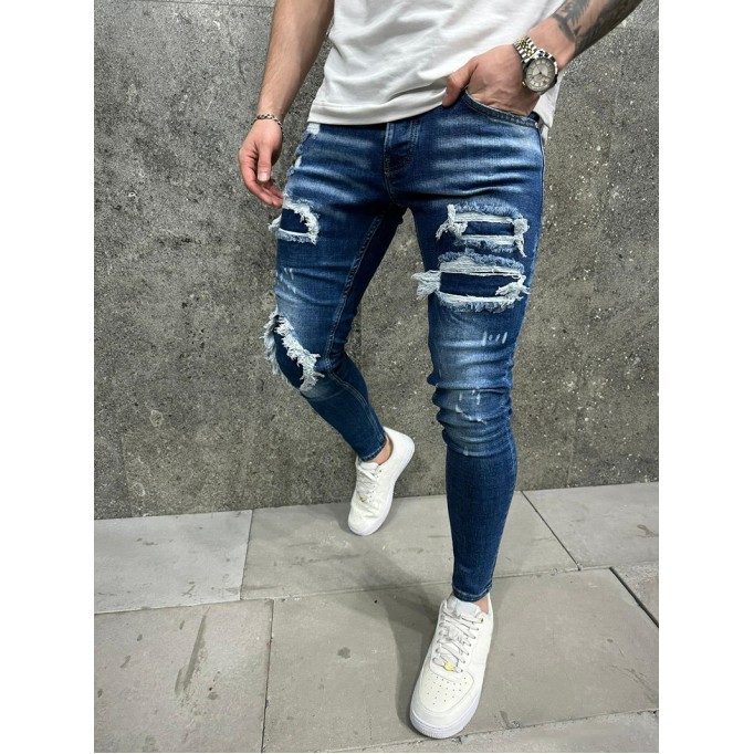 Blue skinny distressed jeans