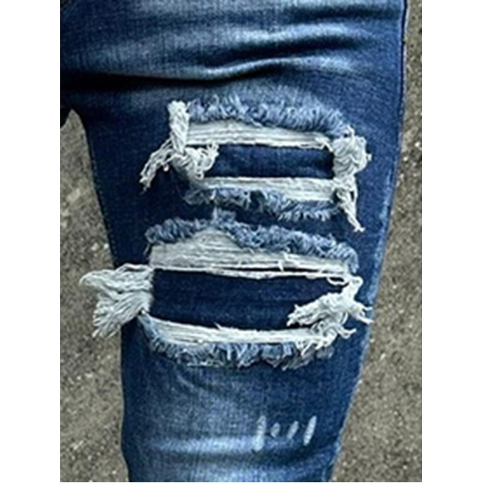 Blue skinny distressed jeans