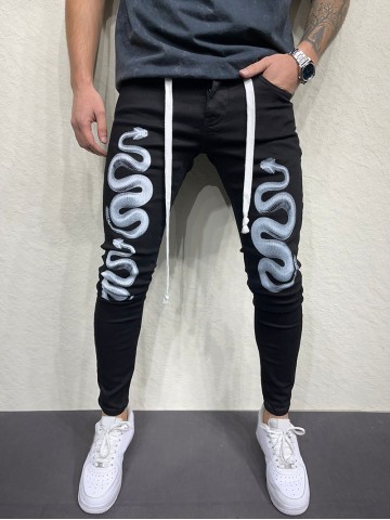 Men's snake patterned skinny jeans